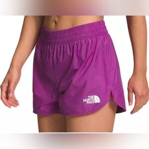 Women’s The North Face NEW purple running shorts  back zipper pocket size Large